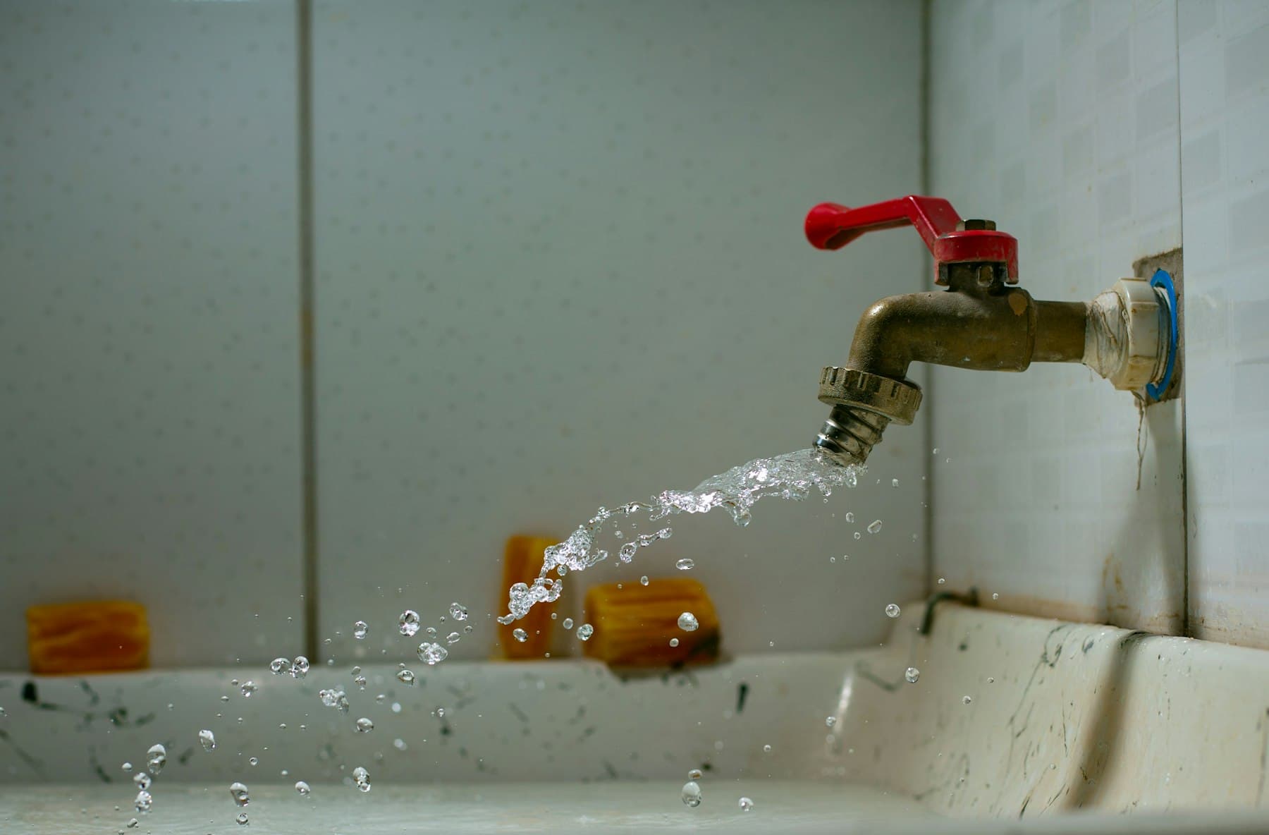 Water running from a kitchen faucet